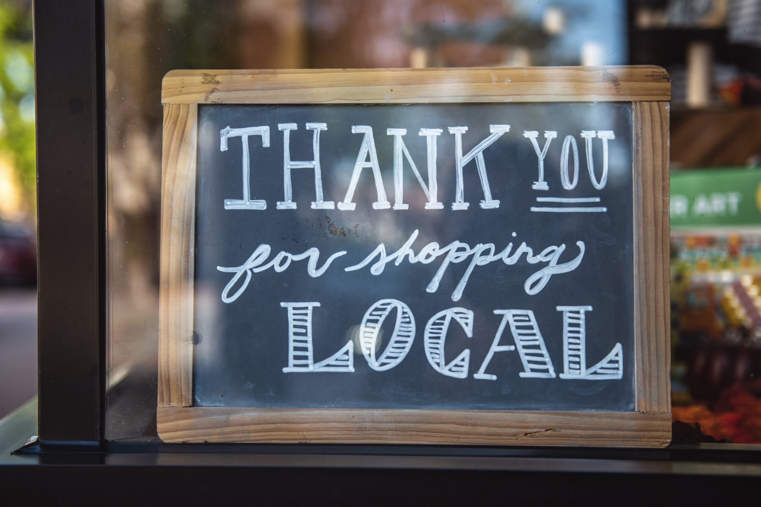 small business with thank you sign in window